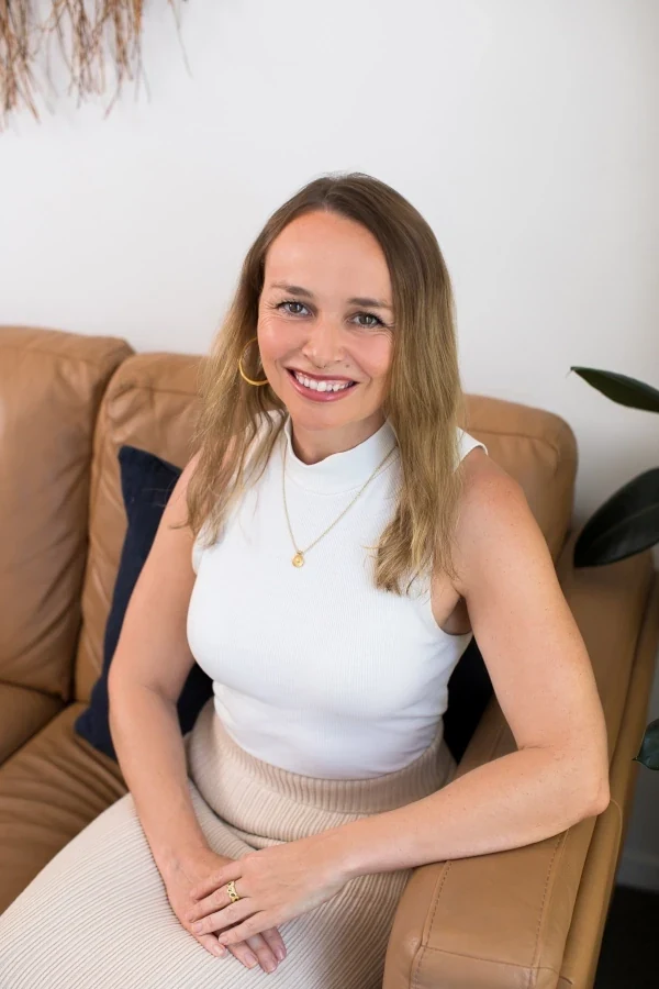 Dr Tara Walker, smiling softly at the camera.